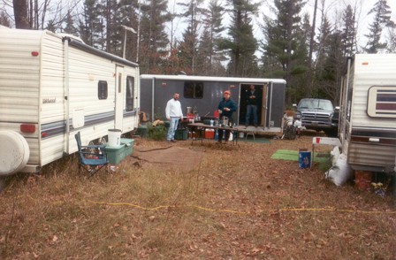 Image of deer bow camp trailers. Peek inside the cargo, just a click away! Escanaba, Michigan, 2001.
